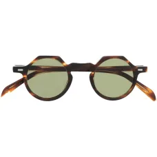 Солнцезащитные очки в круглой оправе черепаховой расцветки