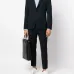 Брюки строгого кроя с подворотами