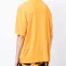 TEMPERA CROSS OVER T-SHIRT OCHER YELLOW