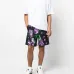 Шорты-бермуды с абстрактным принтом