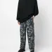 Прямые брюки с абстрактным принтом