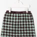 Юбка в ломаную клетку
