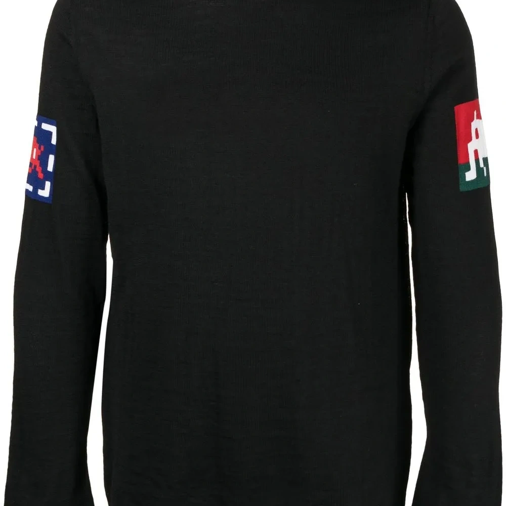 Свитер вязки интарсия