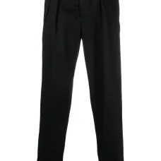 Зауженные брюки со складками