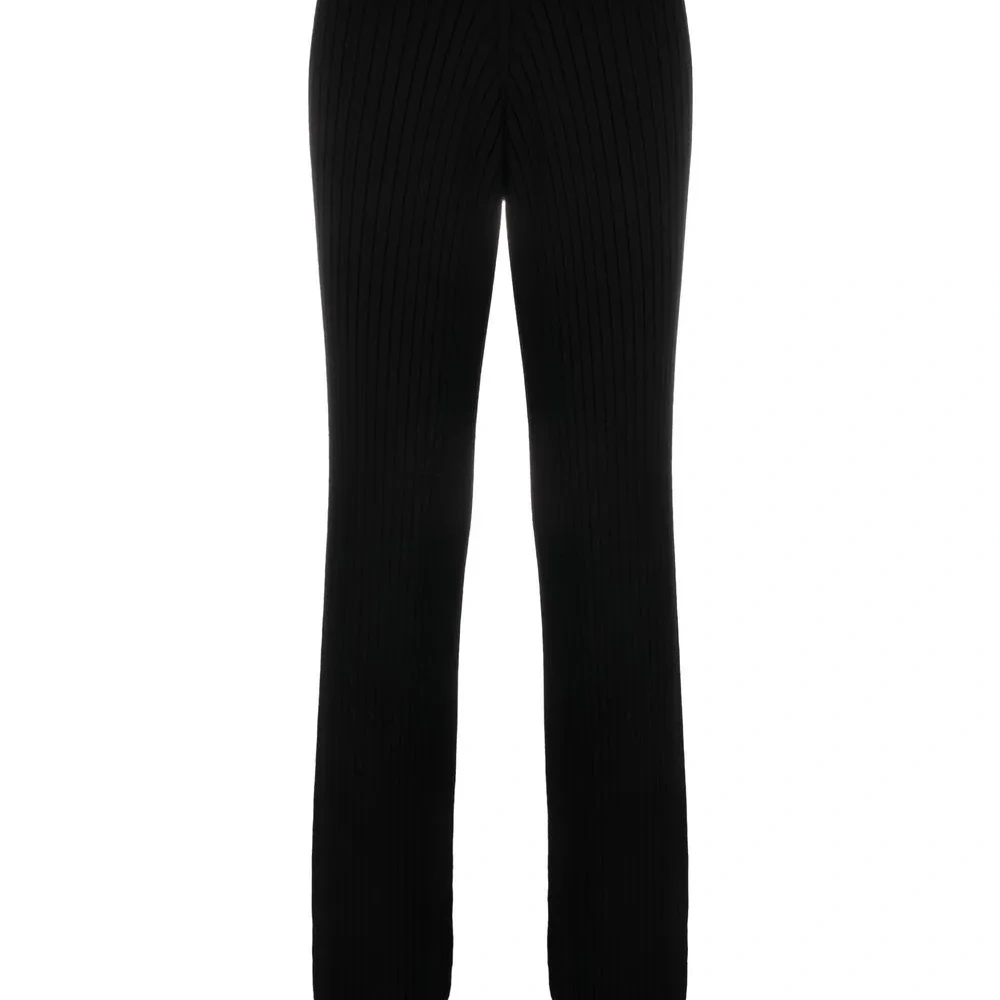 Расклешенные брюки в рубчик