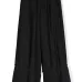 Плиссированные брюки широкого кроя