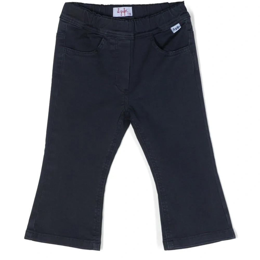 Расклешенные брюки с карманами