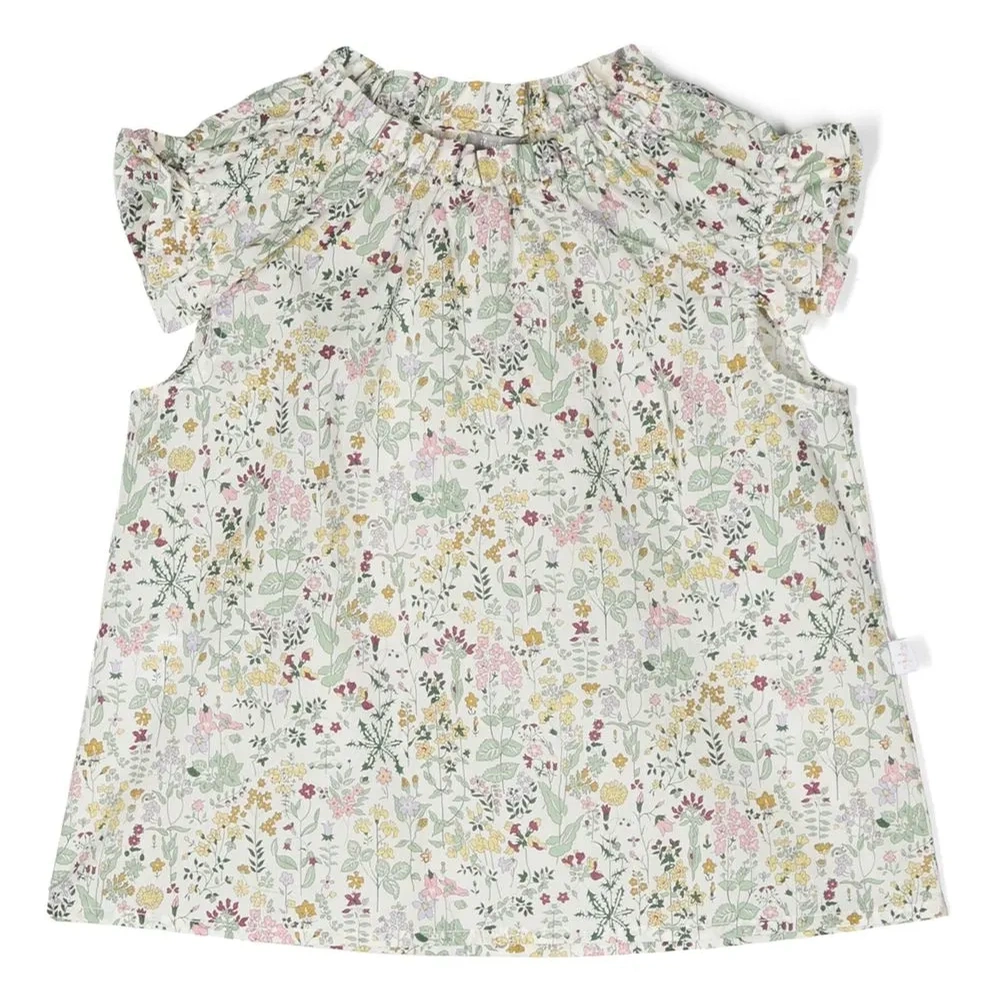 Брюки с оборками и цветочным принтом