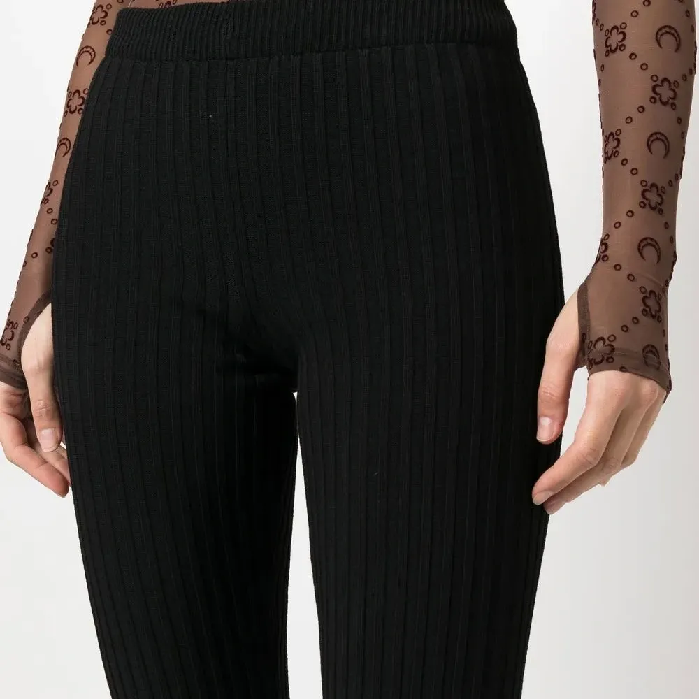 Брюки в рубчик с вырезами