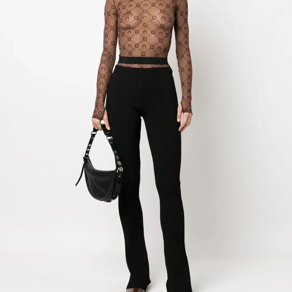 Брюки в рубчик с вырезами