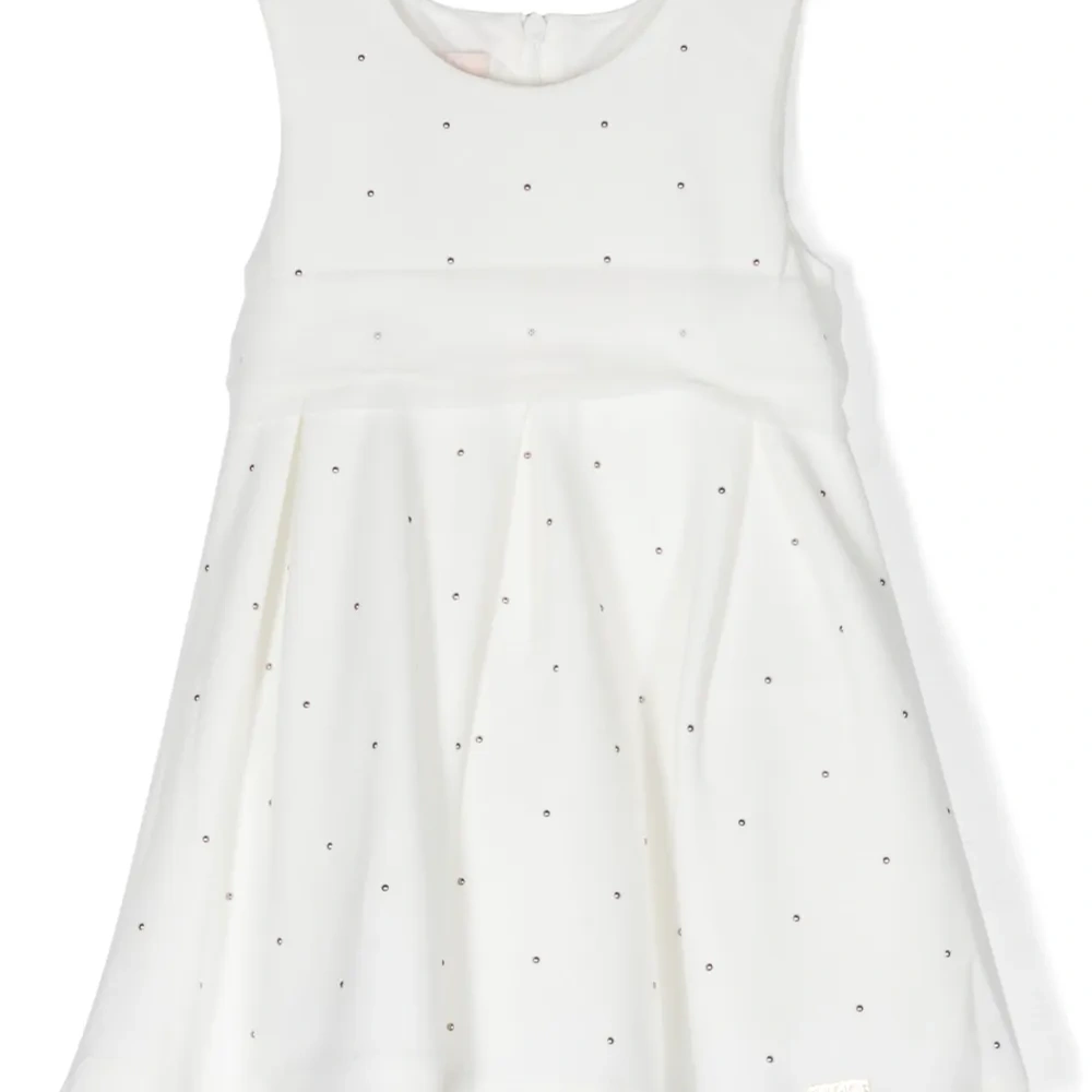 Платье без рукавов с заклепками