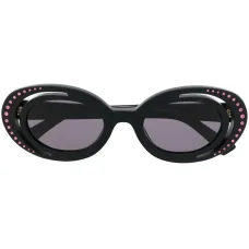 Солнцезащитные очки в овальной оправе с кристаллами