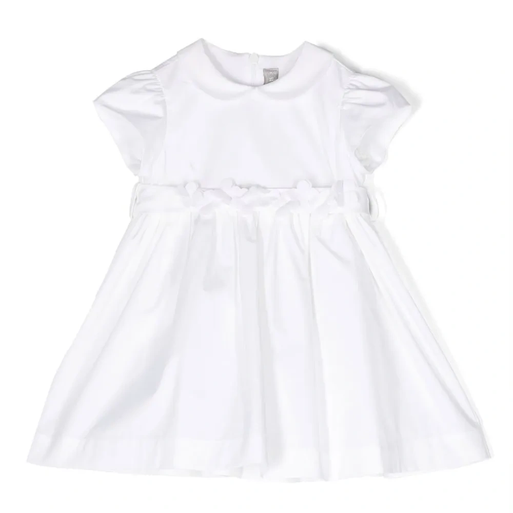 Расклешенное платье с бантом