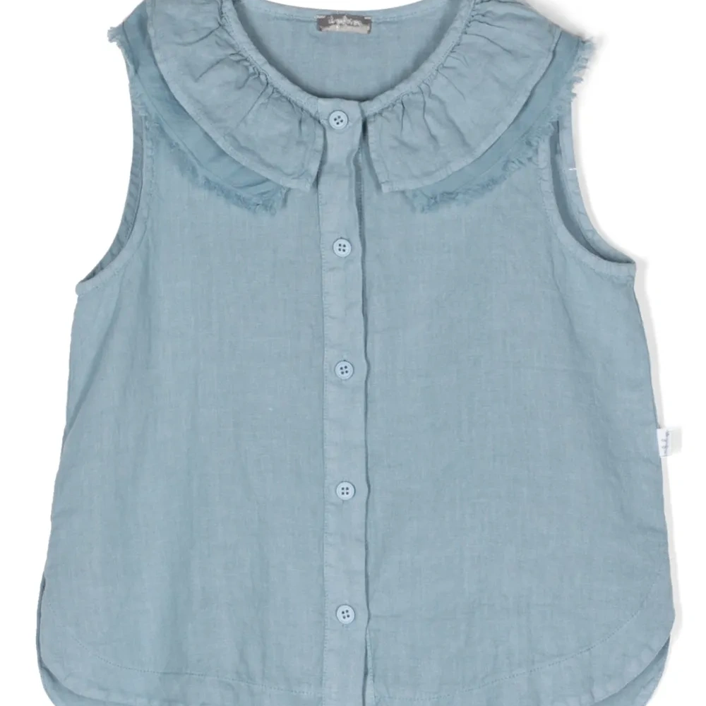 Блузка без рукавов с бахромой