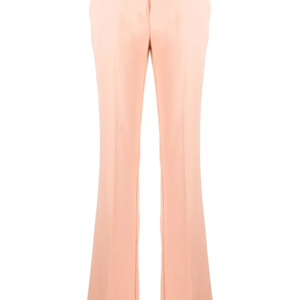 Расклешенные брюки со складками