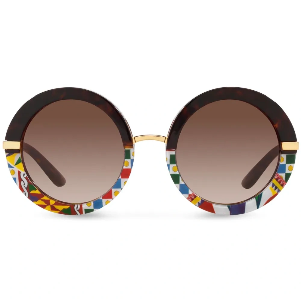 Солнцезащитные очки в круглой оправе черепаховой расцветки