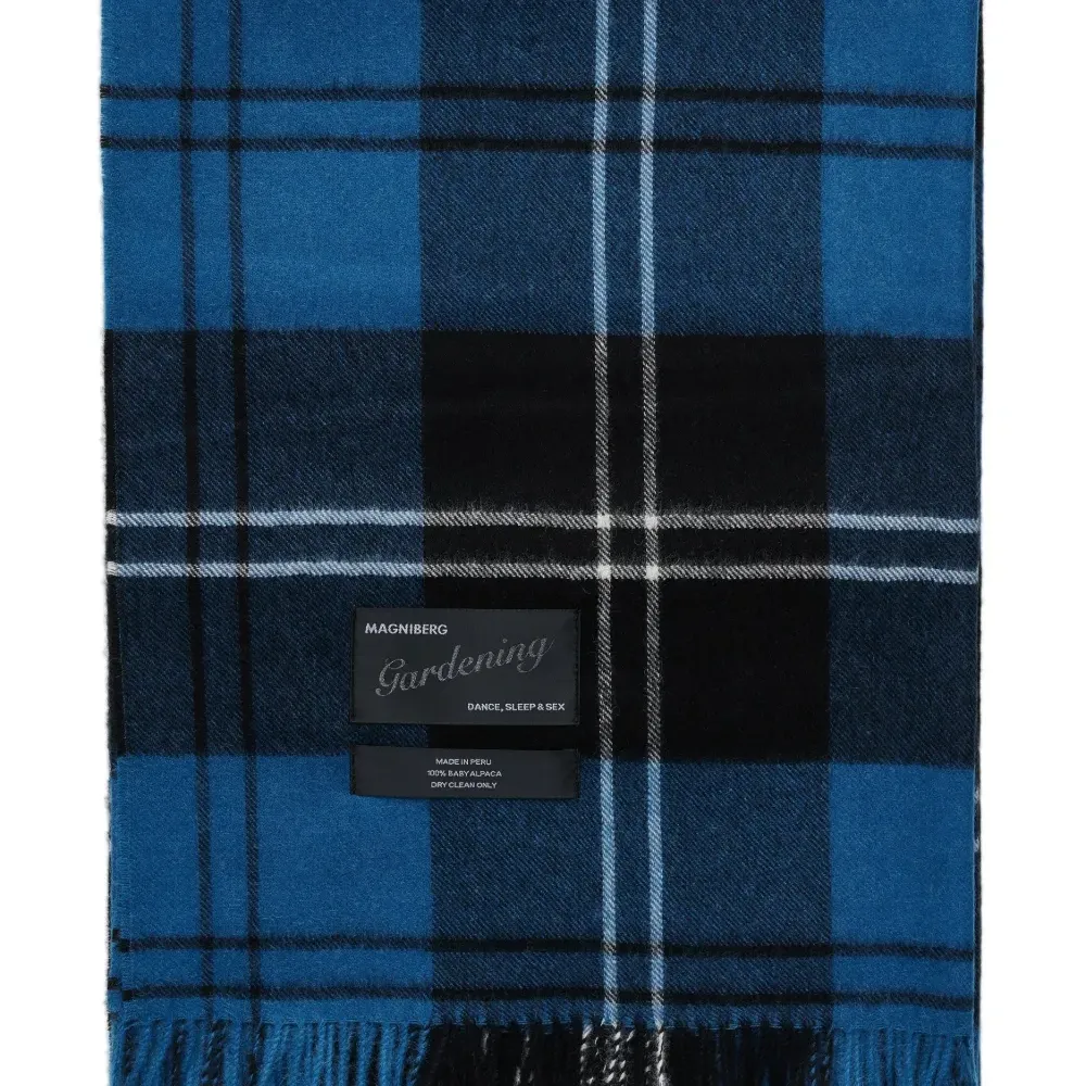 Одеяло из шерсти альпаки с нашивкой-логотипом