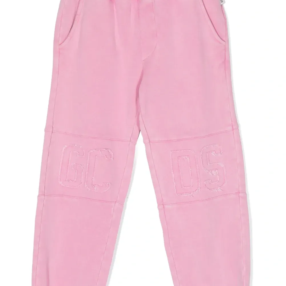 Брюки с тисненым логотипом