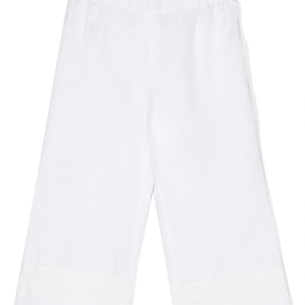 Льняные брюки с кружевной аппликацией