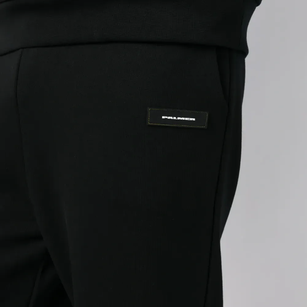 Спортивные брюки с вышитым логотипом