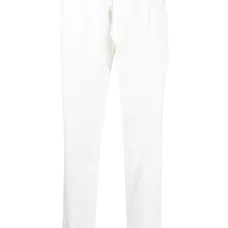 Зауженные брюки со складками