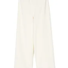 Бархатные брюки с заклепками и логотипом