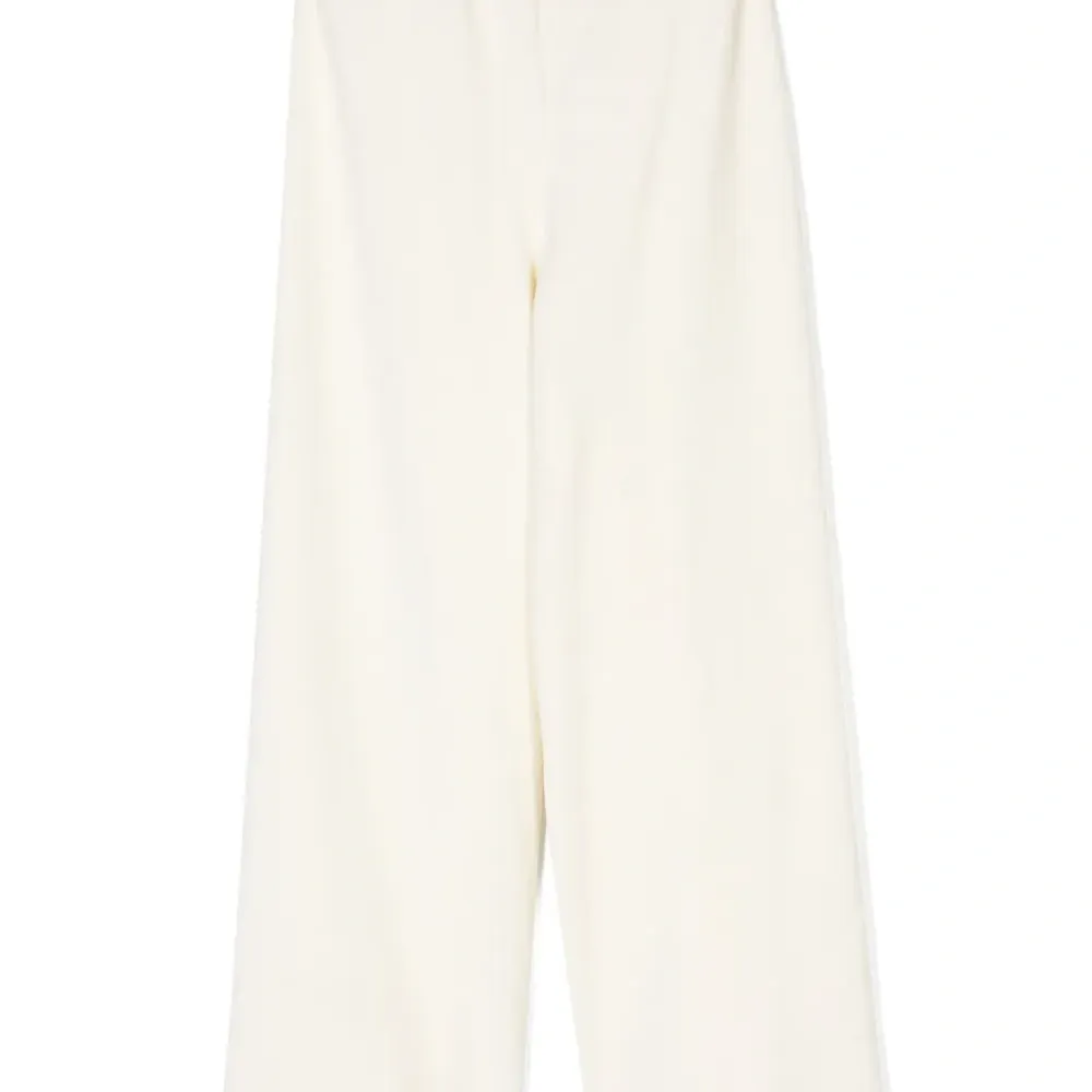 Бархатные брюки с заклепками и логотипом