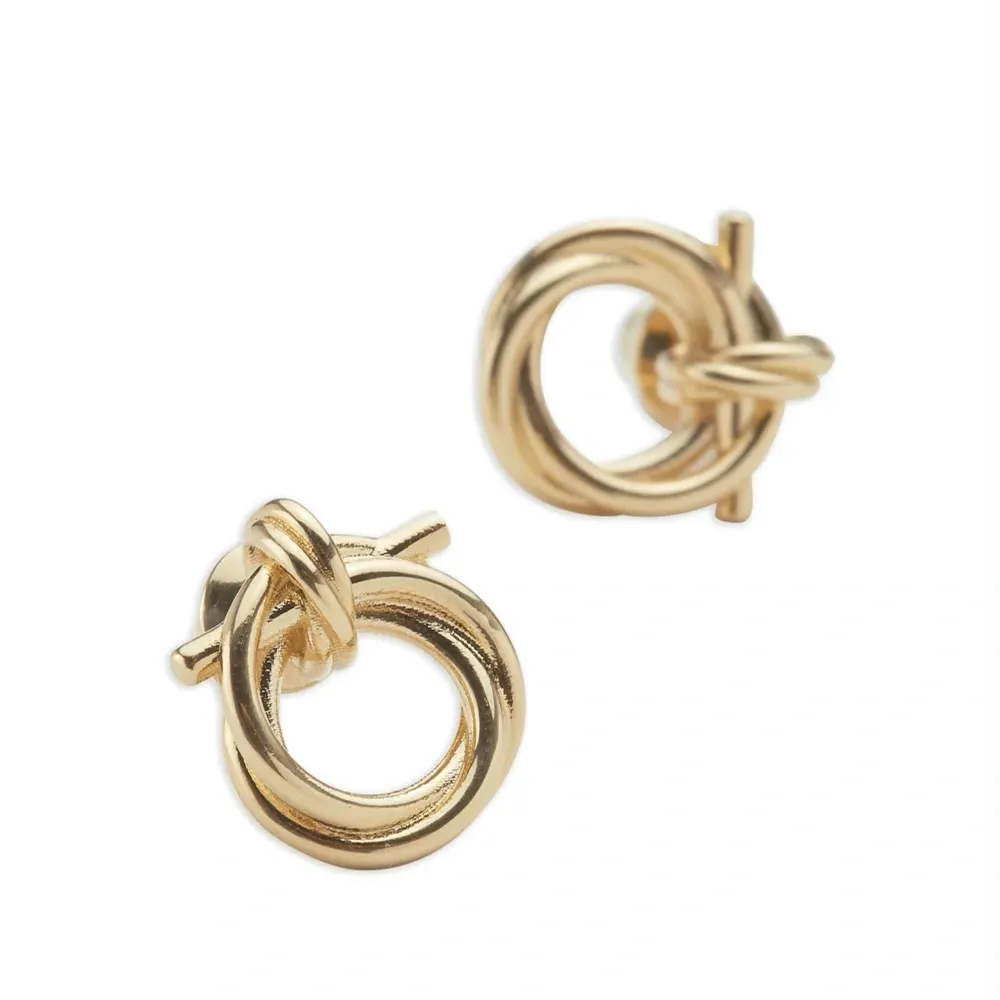Витые серьги-кольца с декором Gancini