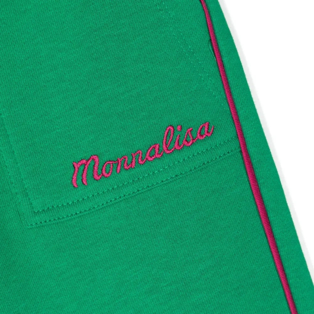 Брюки с вышитым логотипом