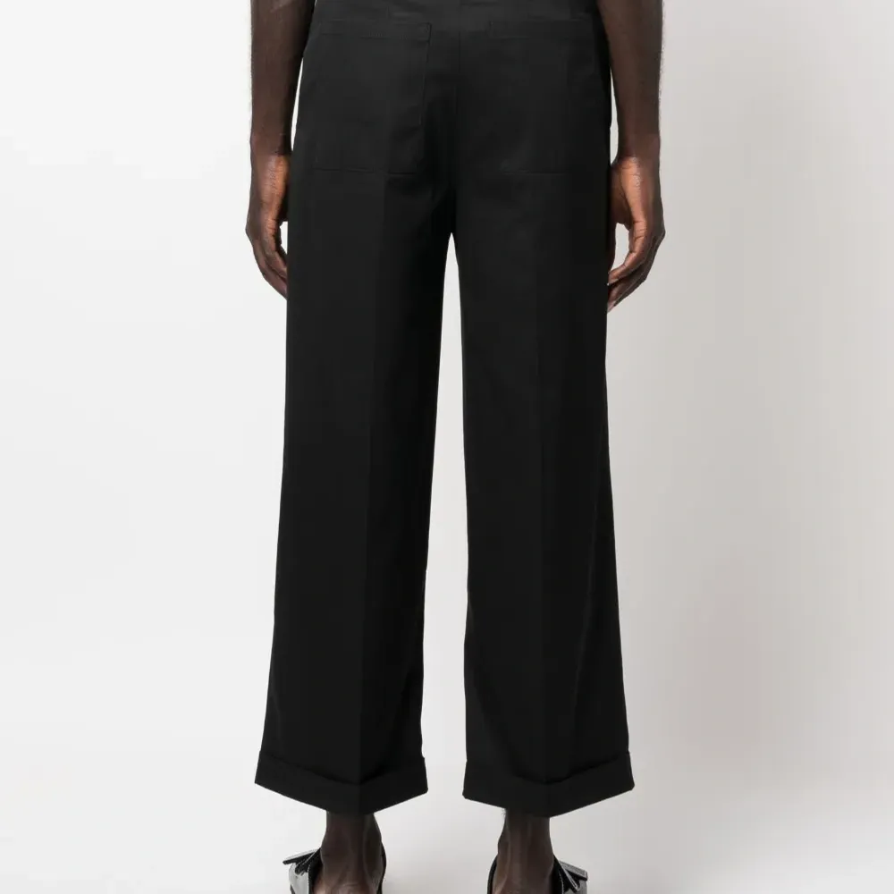 Укороченные брюки со складками