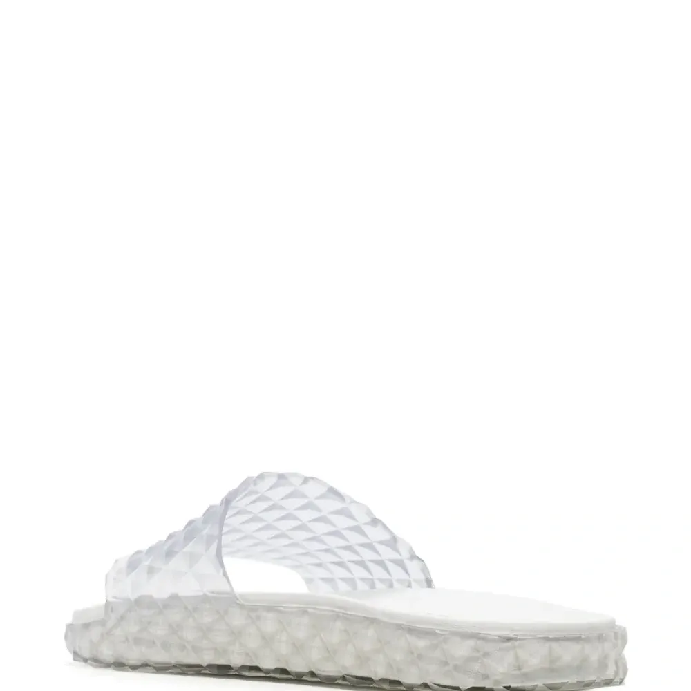 Фактурные шлепанцы из коллаборации с Melissa