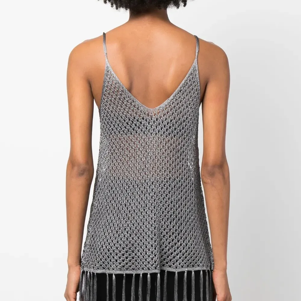 Топ рыхлой вязки с бахромой