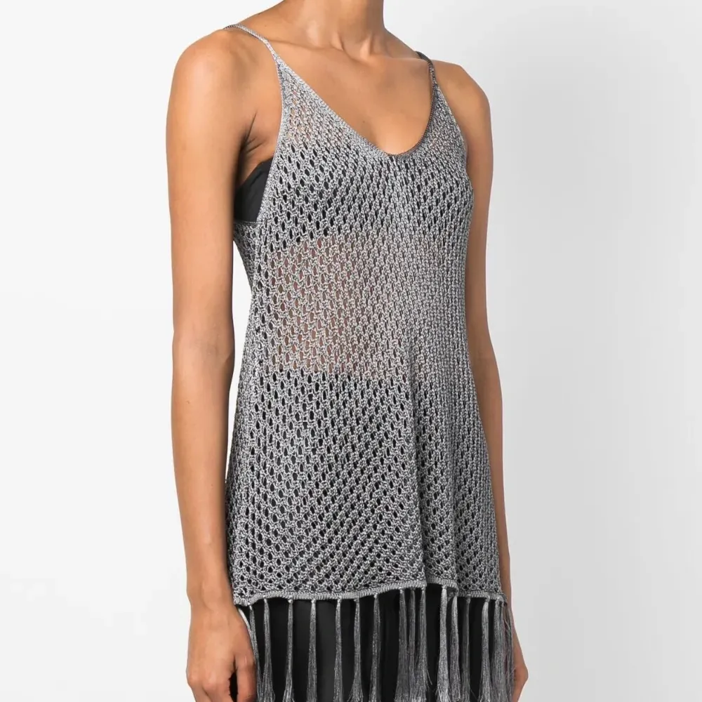 Топ рыхлой вязки с бахромой