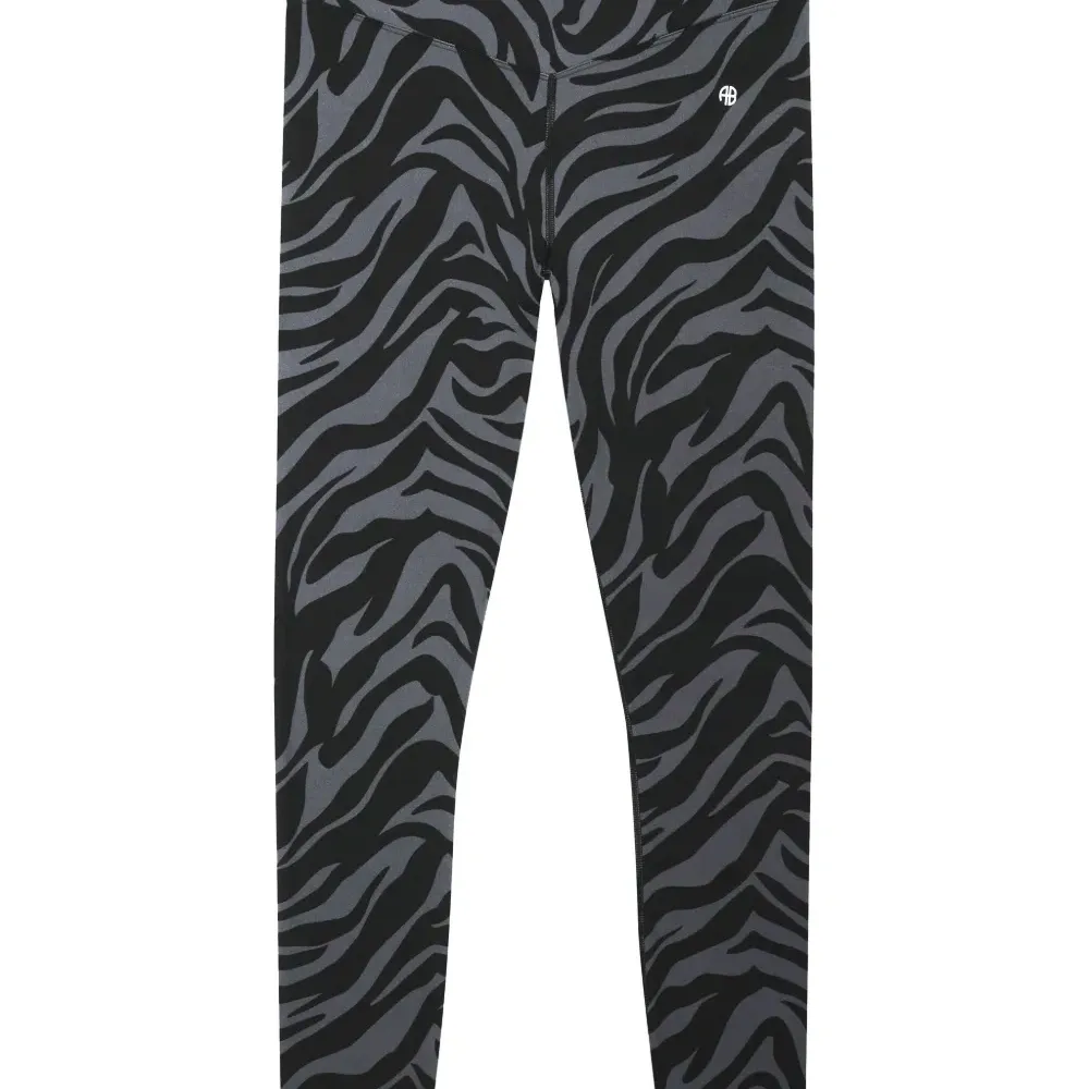 Легинсы с зебровым принтом