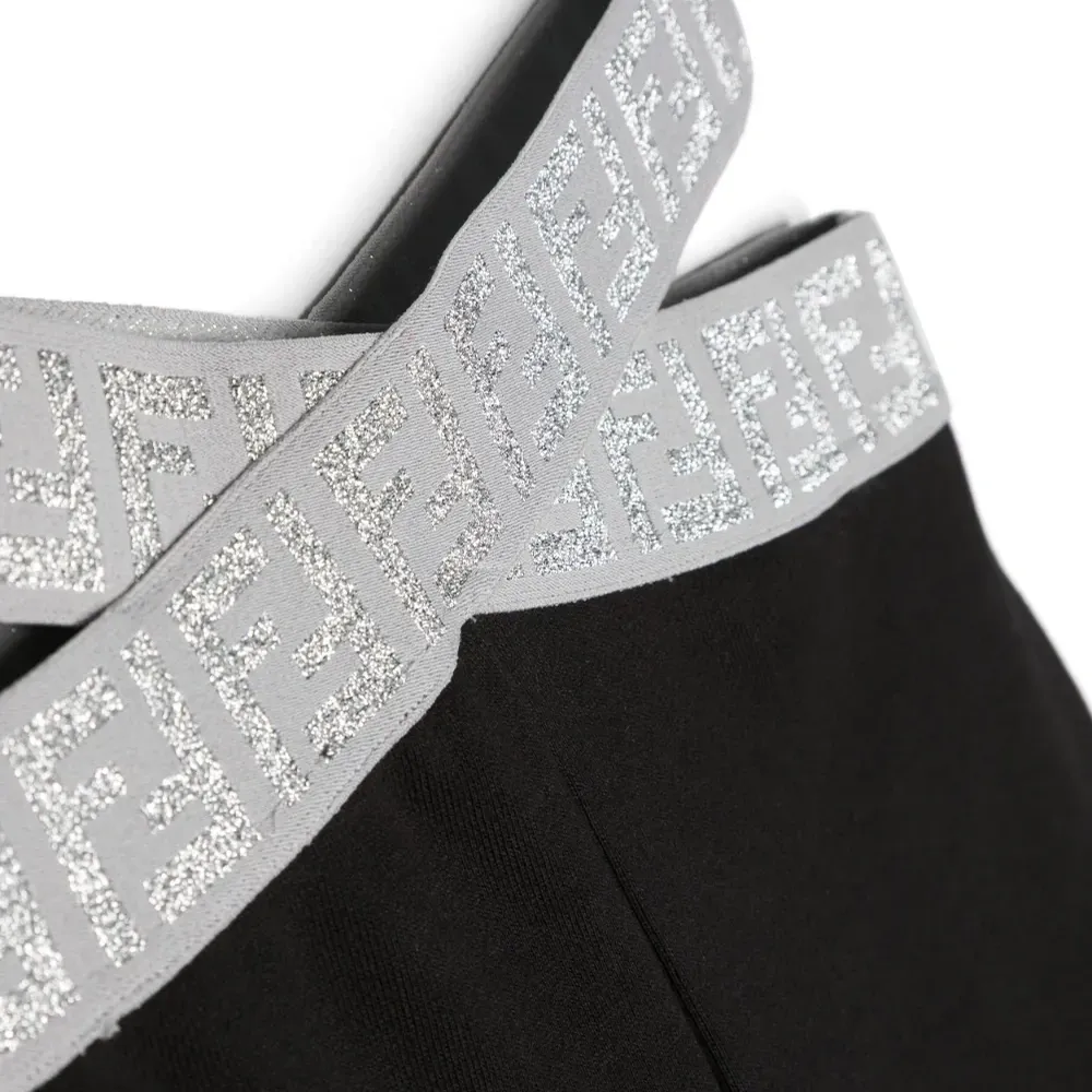 Брюки с перекрестными вставками на поясе