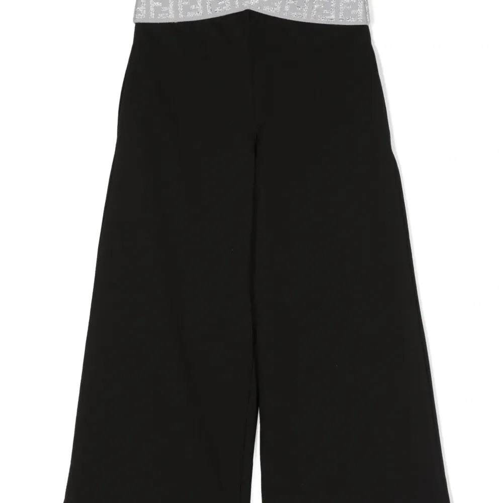 Брюки с перекрестными вставками на поясе