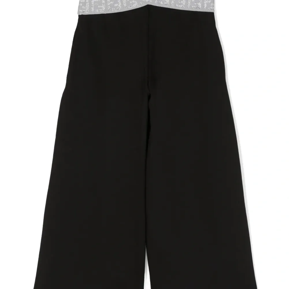 Брюки с перекрестными вставками на поясе