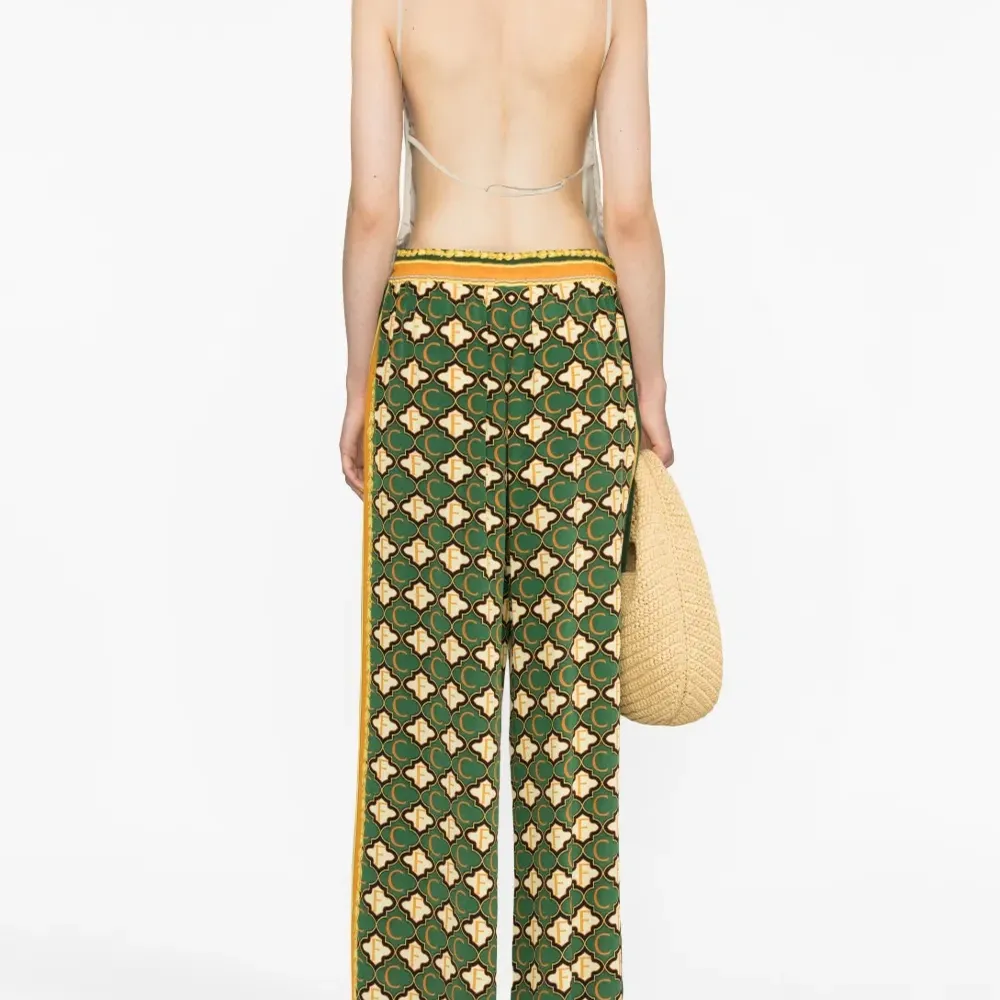 Брюки палаццо с геометричным принтом