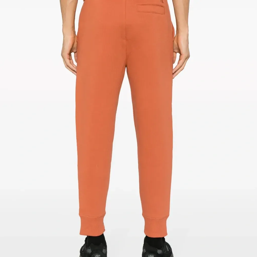 Спортивные брюки с вышитым логотипом