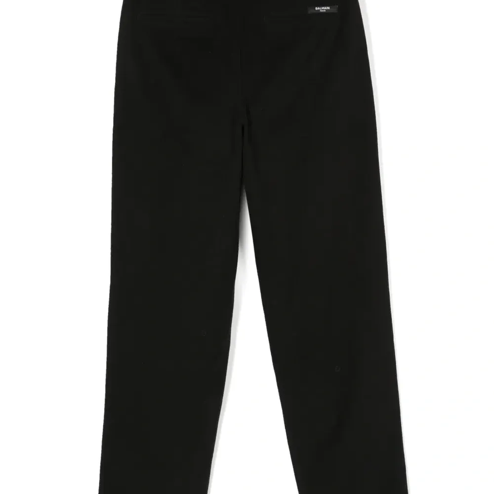 Брюки прямого кроя со складками