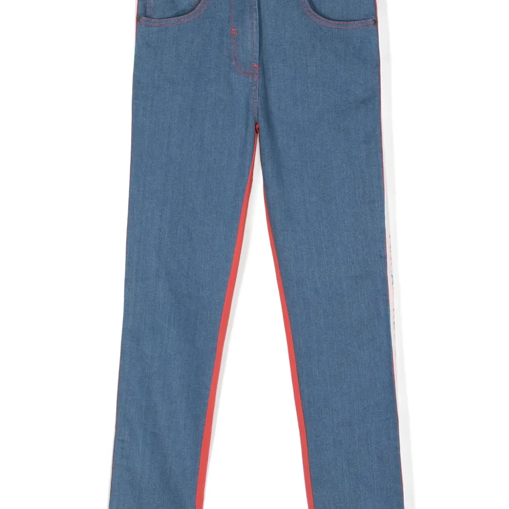 Джинсы скинни с логотипами на лампасах