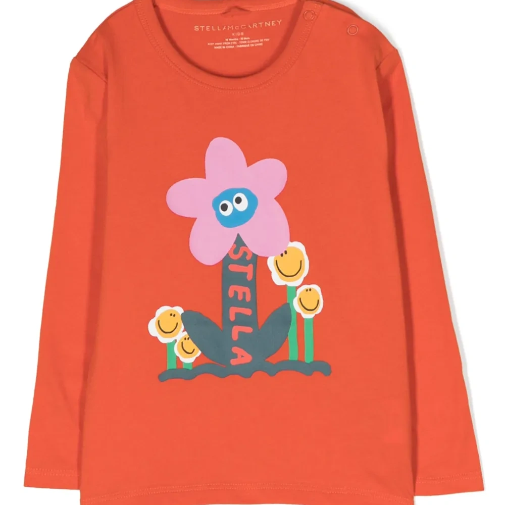 Футболка с длинными рукавами и цветочным принтом