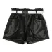 Faux-leather belted shorts