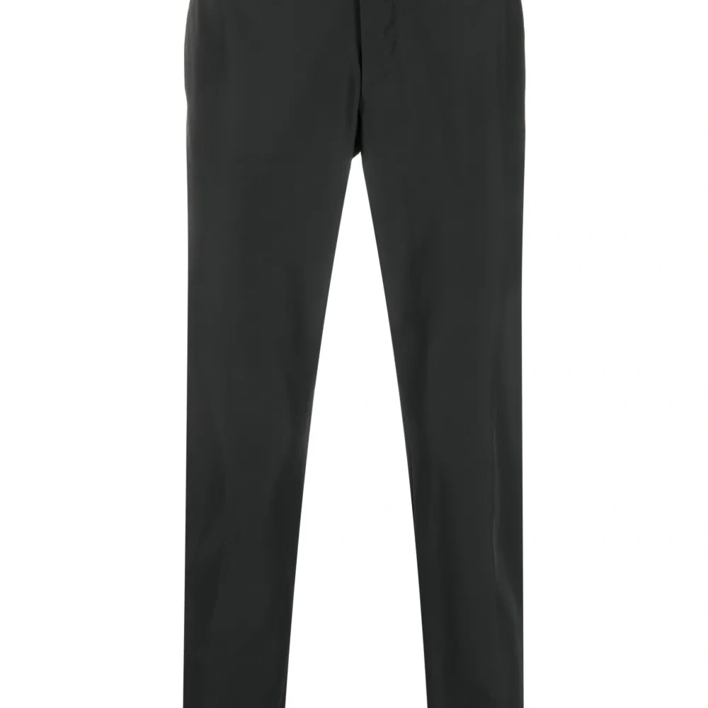 Зауженные брюки с потайной застежкой