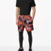 Многослойные спортивные брюки с абстрактным принтом Многослойные спортивные брюки с абстрактным принтом