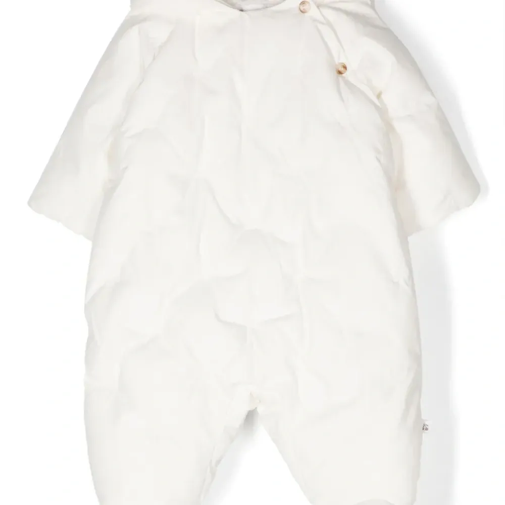 Стеганый зимний комбинезон с капюшоном