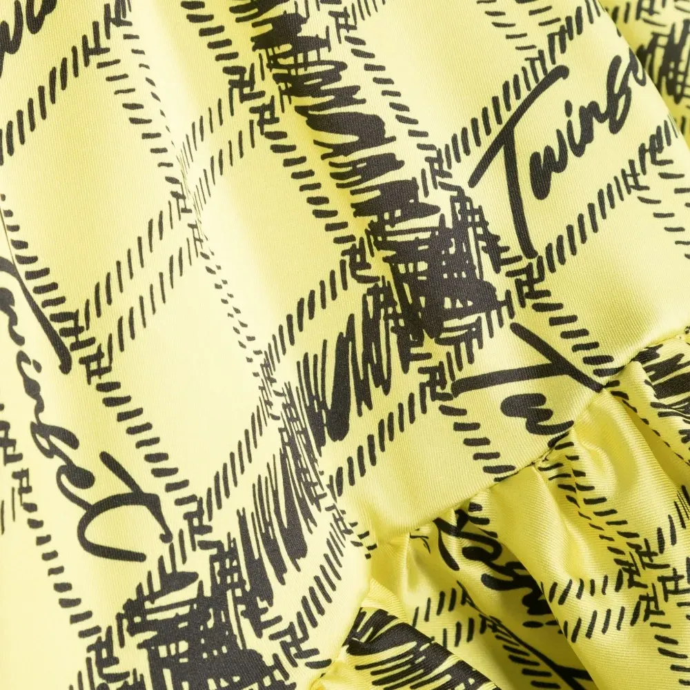 Клетчатое платье с оборками и логотипом