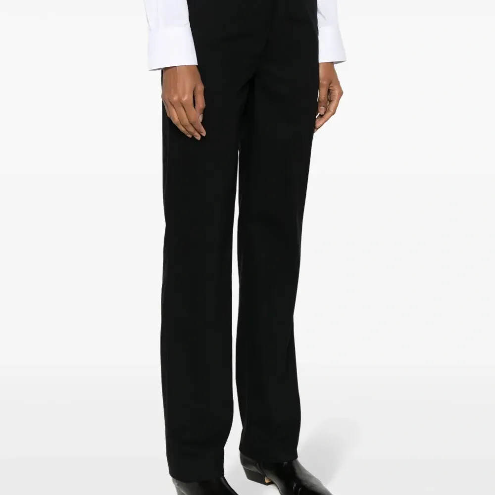 Шерстяные брюки строгого кроя