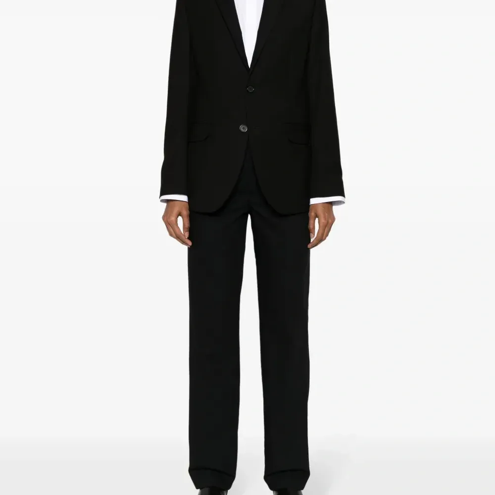 Шерстяные брюки строгого кроя