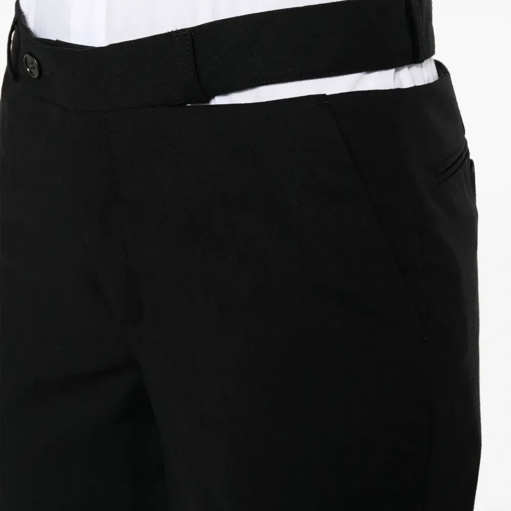 Шерстяные брюки строгого кроя